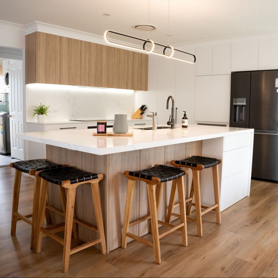 Renovated kitchen with pendant lighting