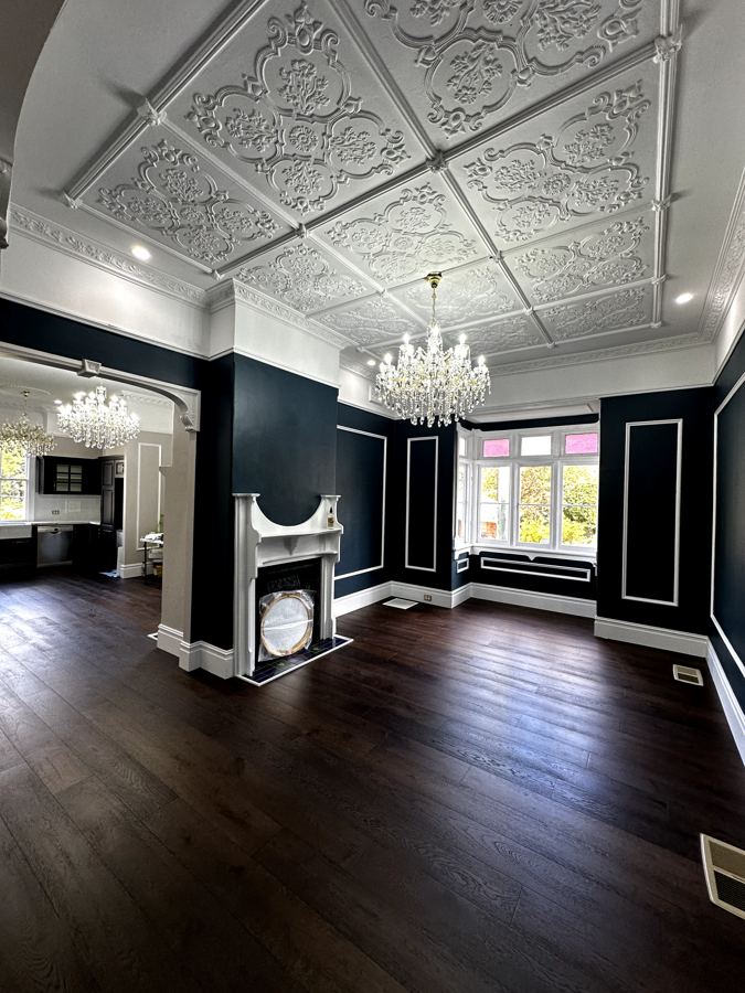 Heritage room with chandelier and pressed-metal ceiling